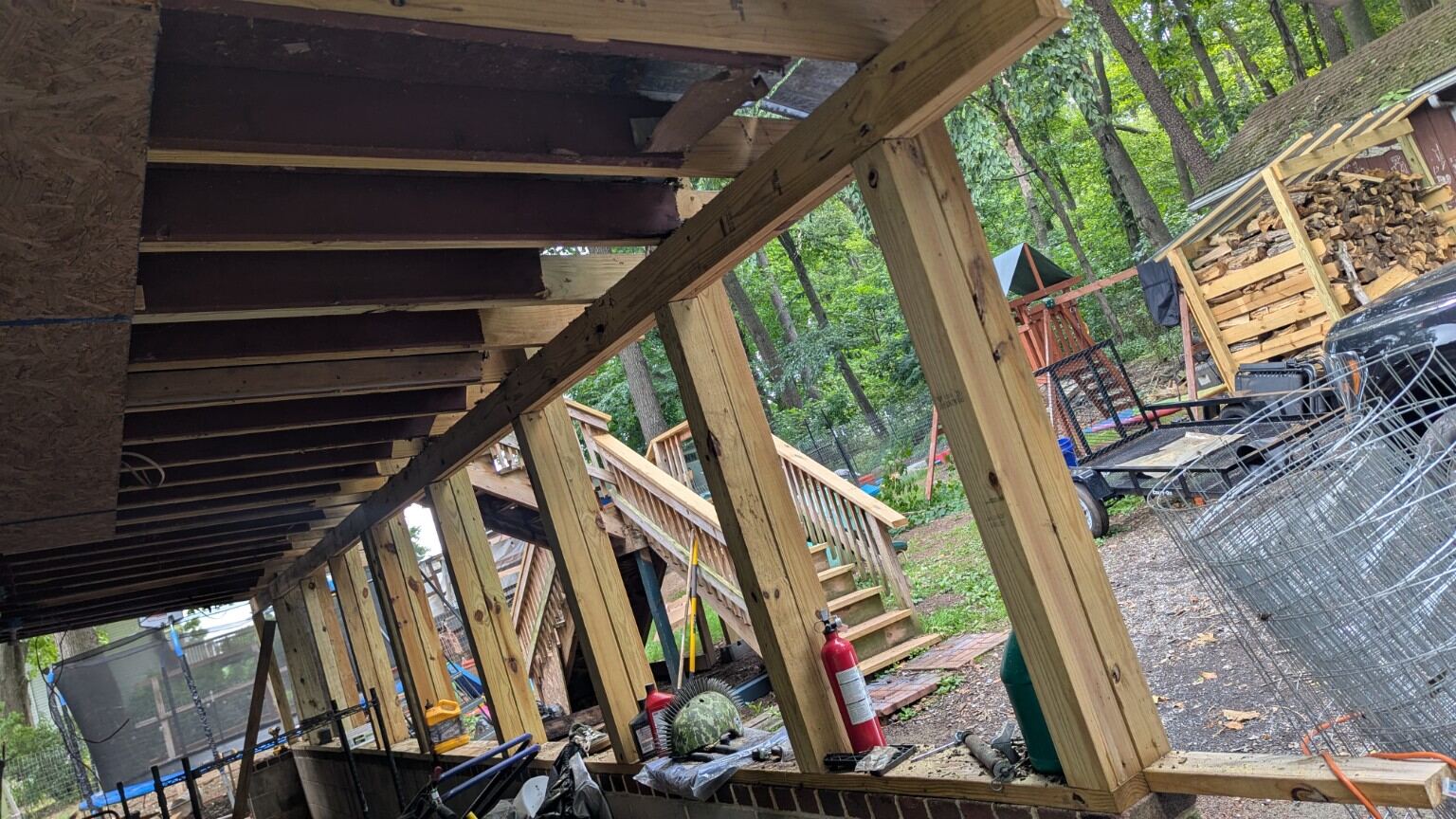 Large porch and deck after structural reframing