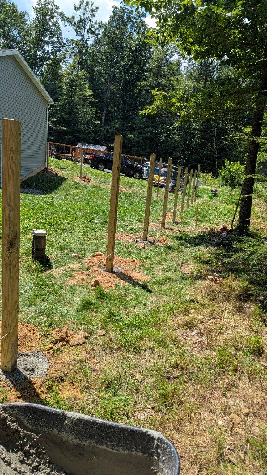 Fence posts set along a layout line
