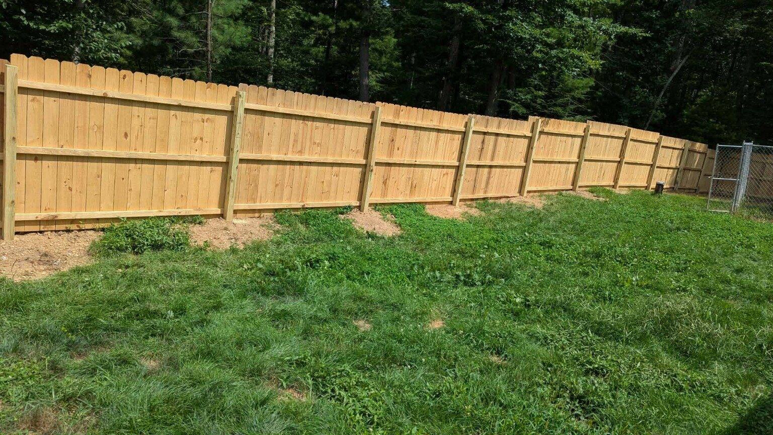 Completed Pitboss wood privacy fence installation